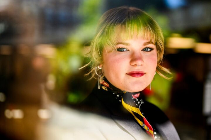 Girl with colorful hair posing for a photo