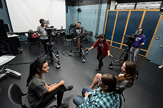 Acting students rehearsing in a studio.