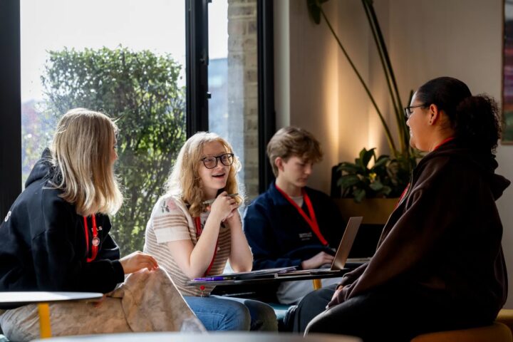 students chatting in a group setting