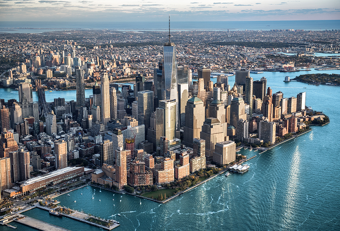 Aerial view of the Lower Manhattan skyline along the waterfront.