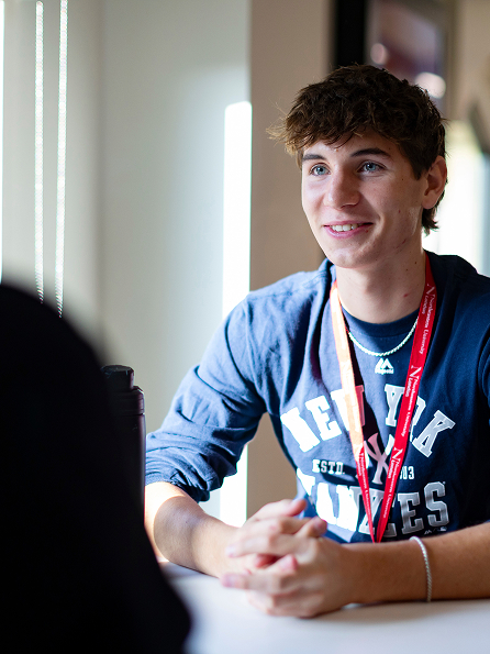 a student smiling.